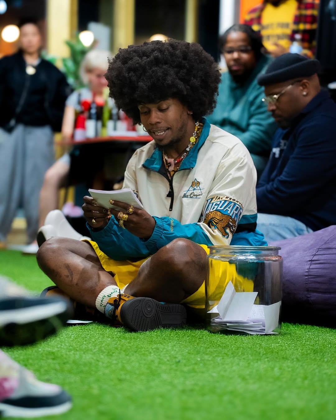 Trinidad James reading a note